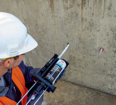 Image of Construction Worker using AT-3G, a new, all-weather hybrid-acrylic anchoring adhesive 