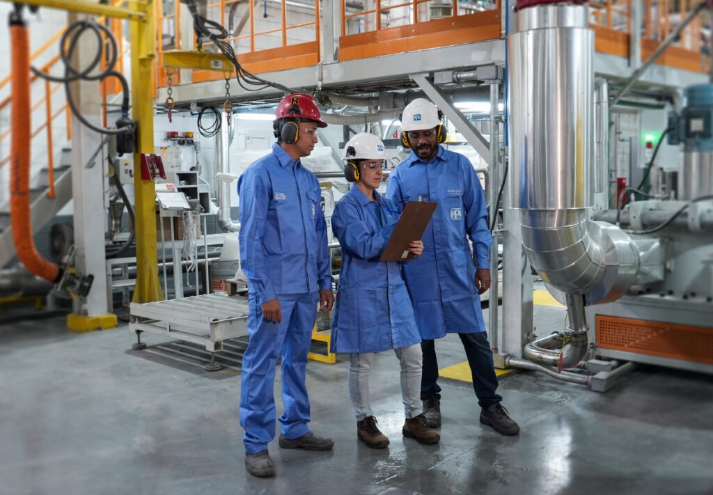 PPG employees working in the newly modernized powder coatings facility in Sumaré, Brazil.