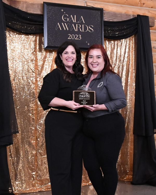 Pictured (l to r): Abby Ivory, Executive Director, Greater Nephi Chamber of Commerce, presents the Chamber’s 2023 Best Employer Award to Carolina Moore, Human Resources Manager, Barrette Outdoor Living