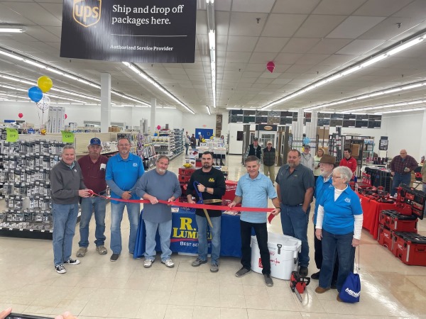 Members of R.P. Lumber’s management team and members of the Sparta Area Chamber of Commerce cut the ribbon at the ribbon cutting ceremony on Friday, November 3, 2023